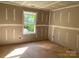 Unfinished room featuring a window view, ready to be transformed into a personalized space at 9130 Dulwich Dr # Ken0079, Charlotte, NC 28215