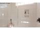 Clean shower with white tile, built-in shelves, and glass enclosure at 9130 Dulwich Dr # Ken0079, Charlotte, NC 28215