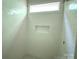 New bathroom shower with white subway tile and inset shelf at 9130 Dulwich Dr # Ken0079, Charlotte, NC 28215