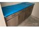 Bathroom vanity featuring brown cabinets and stylish gold hardware at 9130 Dulwich Dr # Ken0079, Charlotte, NC 28215