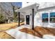 Close-up of the front porch with dark posts and concrete path at 1097 Georgetown Rd, Lincolnton, NC 28092