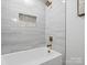 Clean bathroom with modern tile and gold fixtures at 201 Seneca Pl, Charlotte, NC 28210