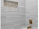 Clean bathroom with modern tile and gold fixtures at 201 Seneca Pl, Charlotte, NC 28210