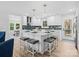 Modern kitchen with white cabinets, quartz countertops, and an island at 201 Seneca Pl, Charlotte, NC 28210