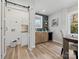 Modern laundry room with stylish cabinets and tile at 201 Seneca Pl, Charlotte, NC 28210