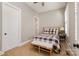 Charming bedroom with a plaid comforter and a bench at the foot of the bed at 3014 Highbury Pl, Weddington, NC 28104