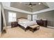 Spacious bedroom with carpeted floor and large windows at 3014 Highbury Pl, Weddington, NC 28104