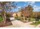 Brick house with driveway and landscaping at 3014 Highbury Pl, Weddington, NC 28104