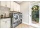 Laundry room with washer, dryer, and exterior access at 3014 Highbury Pl, Weddington, NC 28104