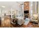 Spacious living room with a stone fireplace and high ceilings at 3014 Highbury Pl, Weddington, NC 28104