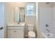 Bathroom with white vanity, toilet and bathtub at 4481 Doyle Ridge Rd, Maiden, NC 28650