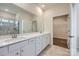 Double vanity bathroom with quartz countertop and walk-in closet at 4481 Doyle Ridge Rd, Maiden, NC 28650