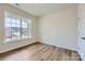 Bright bedroom with hardwood floors and large window at 4481 Doyle Ridge Rd, Maiden, NC 28650