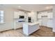 White kitchen with stainless steel appliances and island at 4481 Doyle Ridge Rd, Maiden, NC 28650