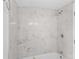 Bathroom featuring a tiled shower with glass doors and modern fixtures at 612 E E St, Newton, NC 28658