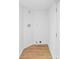 Functional laundry area with laminate flooring and essential utility connections at 612 E E St, Newton, NC 28658