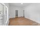 This is a living room with vinyl floors and large windows for lots of light at 612 E E St, Newton, NC 28658
