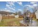 Fenced backyard with patio and small shed at 7546 Lady Liberty Ln, Charlotte, NC 28217