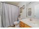 Bathroom with single vanity, toilet and shower at 7546 Lady Liberty Ln, Charlotte, NC 28217