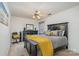 Bedroom with king-size bed and yellow blanket at 7546 Lady Liberty Ln, Charlotte, NC 28217