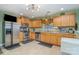 Spacious kitchen with wood cabinets, stainless steel appliances, and granite countertops at 7546 Lady Liberty Ln, Charlotte, NC 28217