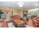 Bright living room with hardwood floors and access to the dining area at 7546 Lady Liberty Ln, Charlotte, NC 28217