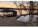 Lakefront pool with boathouse view at 8058 Edgewater Dr, Norwood, NC 28128