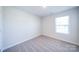 Bright bedroom featuring neutral walls and carpet at 2033 White Cypress Ct # Kh06, Charlotte, NC 28216