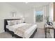 Bright bedroom with a comfy bed and window at 2033 White Cypress Ct # Kh06, Charlotte, NC 28216