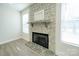 Stone fireplace with a modern design in the living area at 2033 White Cypress Ct # Kh06, Charlotte, NC 28216