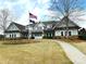 Inviting community clubhouse featuring manicured landscaping, American flag, and a welcoming entrance at 3006 Cricket Ln, Lancaster, SC 29720