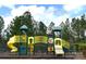 Community playground featuring colorful climbing structures and slides for hours of fun and activity at 3006 Cricket Ln, Lancaster, SC 29720