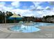 Community pool with water features and a covered seating area, perfect for Gathering fun at 3006 Cricket Ln, Lancaster, SC 29720