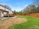 Large backyard with deck, pergola, and wood fence at 3417 Chilham Pl, Charlotte, NC 28226