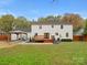 Backyard view showcasing home's exterior and deck at 3417 Chilham Pl, Charlotte, NC 28226