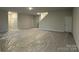 Unfinished basement with neutral walls and carpet at 401 Imperial Way # 25, Albemarle, NC 28001