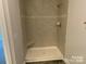 Bathroom with tiled shower and built-in seat at 401 Imperial Way # 25, Albemarle, NC 28001