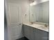 Double vanity bathroom with gray cabinets at 401 Imperial Way # 25, Albemarle, NC 28001