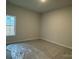 Simple bedroom with window and neutral walls at 401 Imperial Way # 25, Albemarle, NC 28001