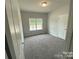 Spacious bedroom with neutral walls and carpet at 401 Imperial Way # 25, Albemarle, NC 28001