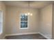 Cozy dining area with hardwood floors and a window with natural light at 401 Imperial Way # 25, Albemarle, NC 28001