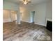 Living room with hardwood floors and ceiling fan at 401 Imperial Way # 25, Albemarle, NC 28001