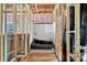 An unfinished bathroom with plumbing and an alcove tub insert at 4615 Yellow Poplar Ln, Concord, NC 28025