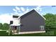 A side view shows the dark siding and a covered porch of the two-story home surrounded by green landscaping at 4615 Yellow Poplar Rd, Concord, NC 28025