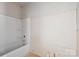 Unfinished bathroom with new tub and fixtures awaiting your personal design and style at 4641 Yellow Poplar Ln, Concord, NC 28025