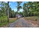 New construction home nestled among tall trees on a wooded homesite in a rural area at 4641 Yellow Poplar Ln, Concord, NC 28025