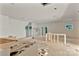 Unfinished living room with drywall, rough flooring, and natural light through windows at 4641 Yellow Poplar Ln, Concord, NC 28025