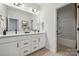 Modern bathroom with double vanity and shower/tub combo at 1194 Lost Cove Rd, Indian Land, SC 29707