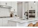 Modern kitchen with white cabinets and an island at 1194 Lost Cove Rd, Indian Land, SC 29707