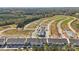 Aerial view of new townhomes under construction with surrounding land at 1198 Lost Cove Rd, Indian Land, SC 29707